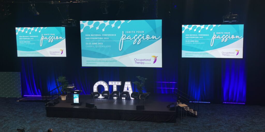 OT CPD Conference stage with screens